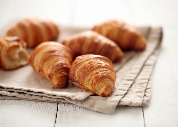 Fresh french croissants on a tablecloth