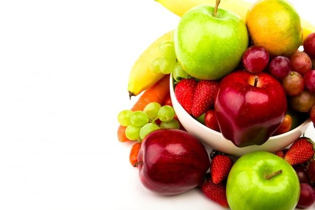 Fresh fruit on plate  Isolated on white