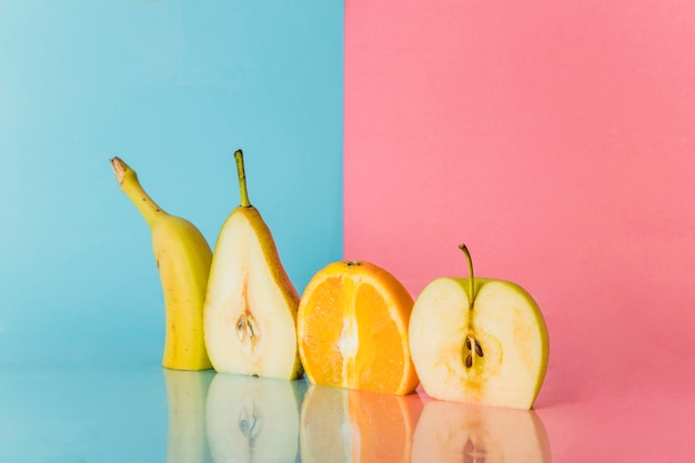 Fresh fruits cut in half