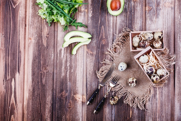 Free photo fresh and healthy food, protein. quail eggs in wooden box stand on the rustic table