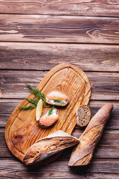 Fresh and healthy food. Snack or lunch ideas. Homemade bread with lemon and salmon