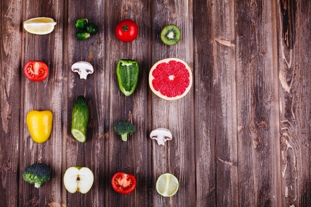 Fresh and healthy food. Yellow and green pepper, lemon, lime, broccoli, tomatoes