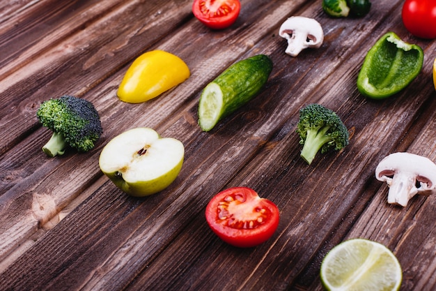 Fresh and healthy food. Yellow and green pepper, lemon, lime, broccoli, tomatoes