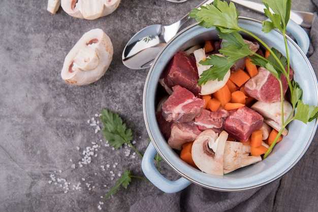 Fresh homemade veggies soup in pot