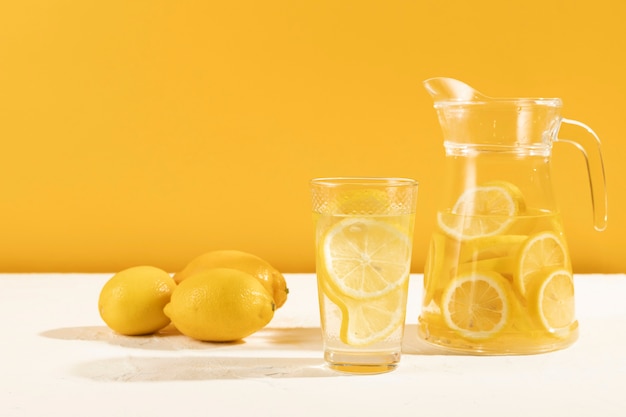 Fresh lemonade in glass on table