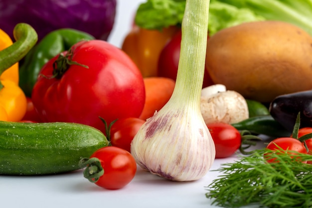 Free photo fresh mixed vegetables on white desk