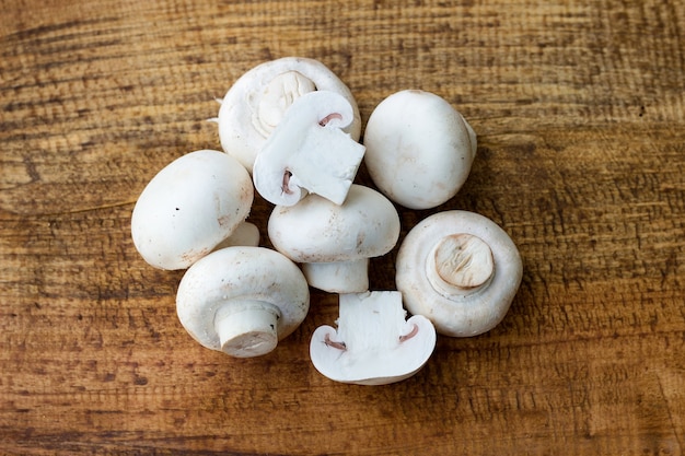 fresh mushrooms on wodden background