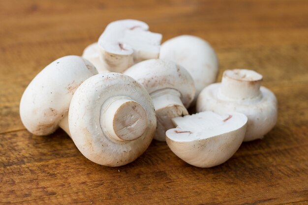 fresh mushrooms on wodden background