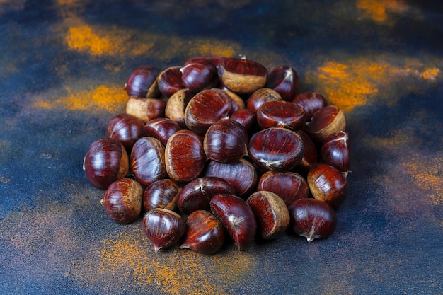 Free photo fresh organic chestnuts.