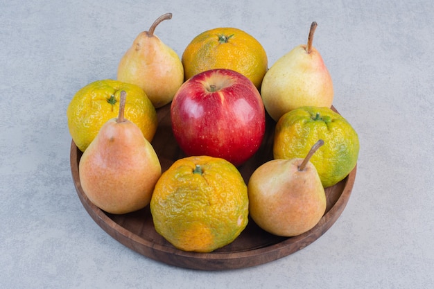 Fresh organic fruits. Apple, pear and tangerines. 