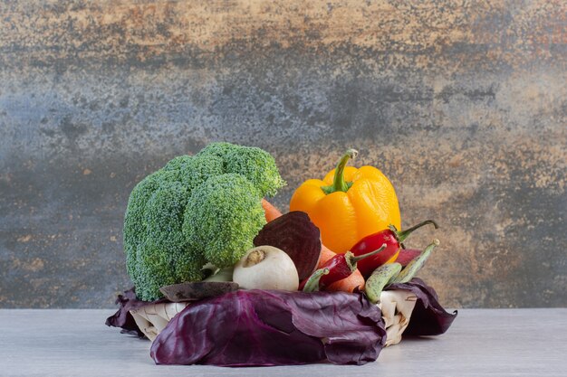 Fresh organic vegetables on stone table. High quality photo