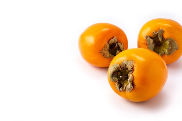 Fresh persimmon fruit isolated on white background