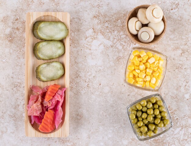 Fresh and pickled vegetables bundled together 