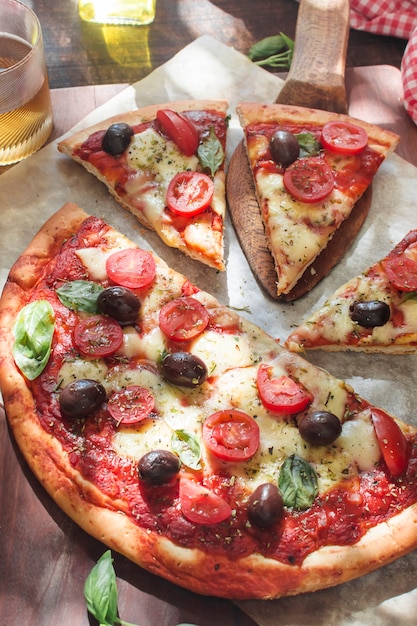 Fresh pizza with tomatoes; cheese and mushrooms