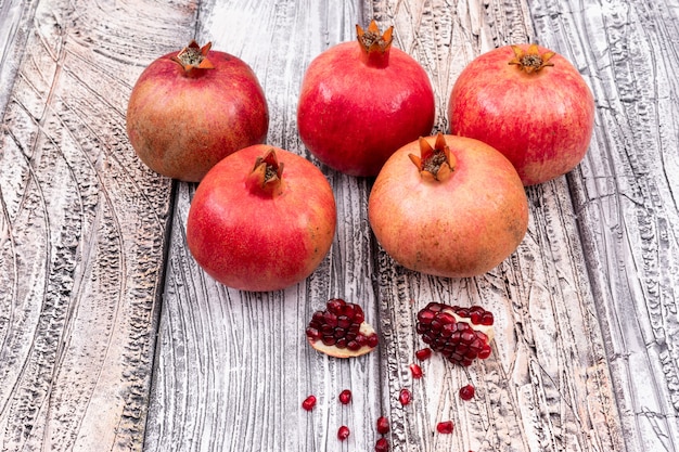 fresh pomegranate on wooden table