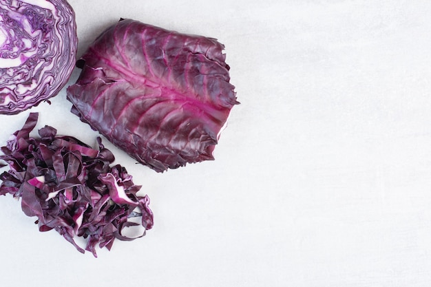 Fresh purple cabbage on stone surface. High quality photo