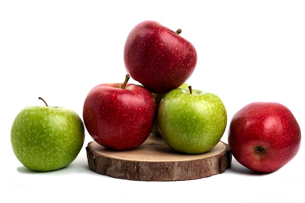 Fresh red and green apples isolated on white.