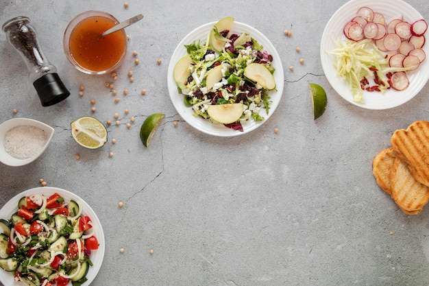 Fresh salad on table with toast