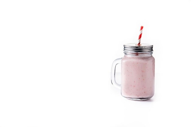 Free photo fresh strawberry and banana smoothie in jar isolated on white background