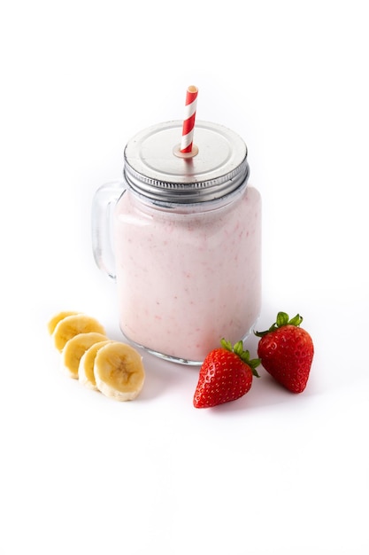 Free photo fresh strawberry and banana smoothie in jar isolated on white background