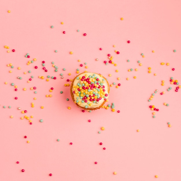 Free Photo fresh tasty cupcake with bright sprinkles 