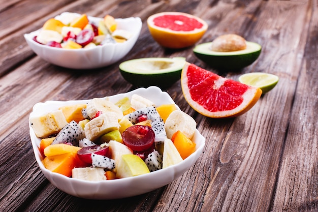 Free photo fresh, tasty and healthy food. lunch or breakfast ideas. salad of dragon fruit, grape, apple