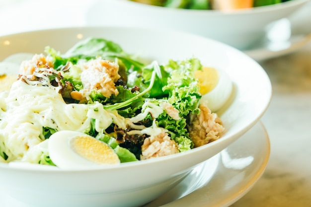 Fresh tuna salad in white bowl