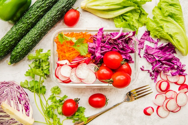 Fresh vegetables and ingredients for salad