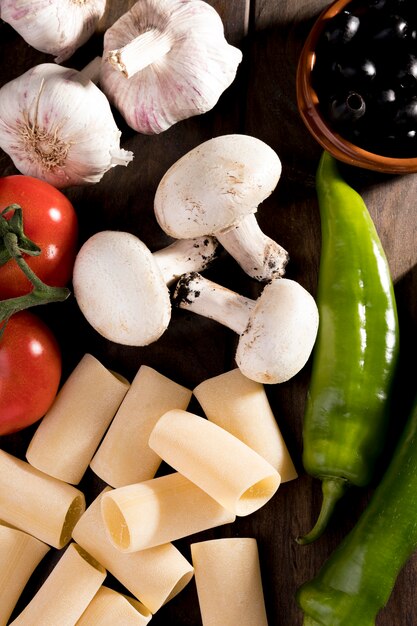 Fresh vegetables for pasta on desk