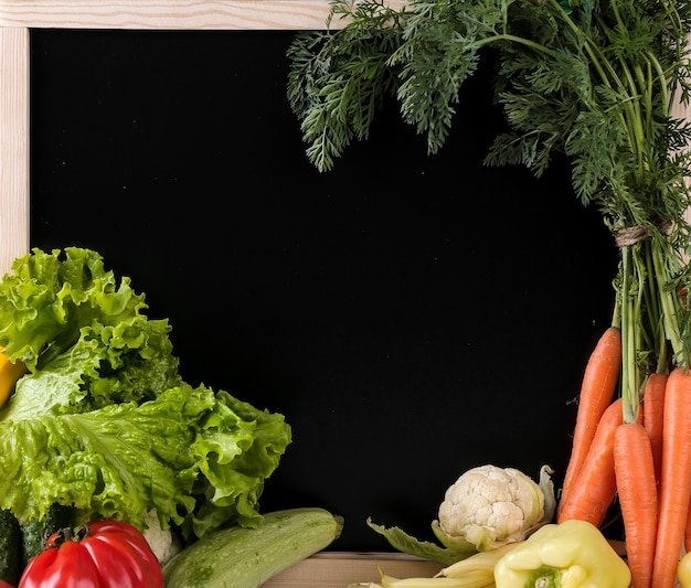 fresh vegetables with a blackboard