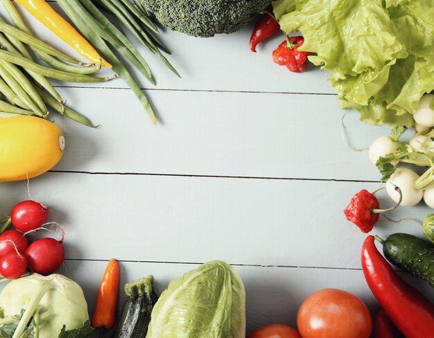 Fresh vegetables on wooden table