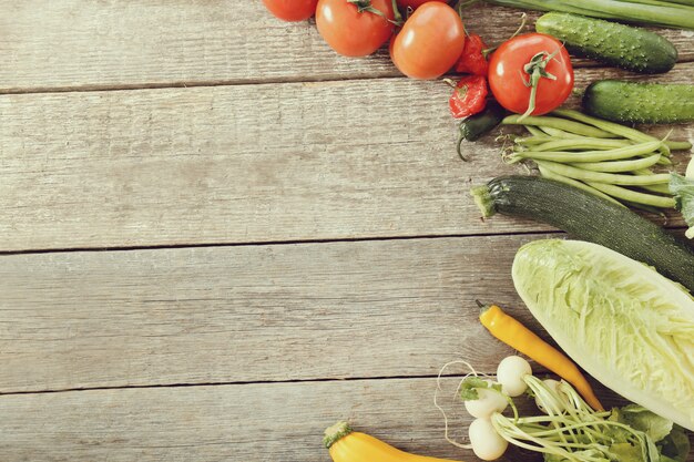 Fresh vegetables on wooden table