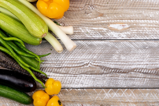 Fresh vegetables on wooden table