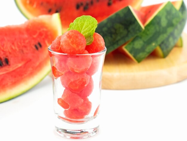 Fresh watermelon in a glass on white background