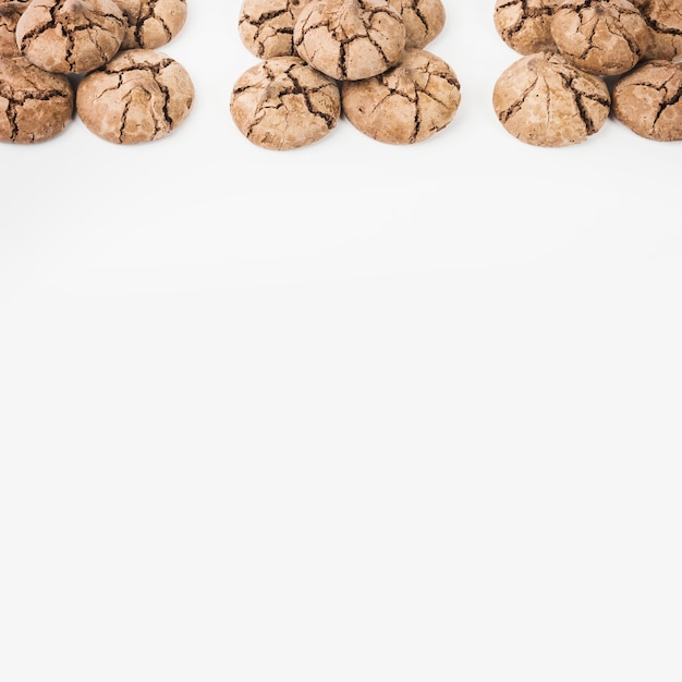 Free photo freshly baked chocolate cookies on white background