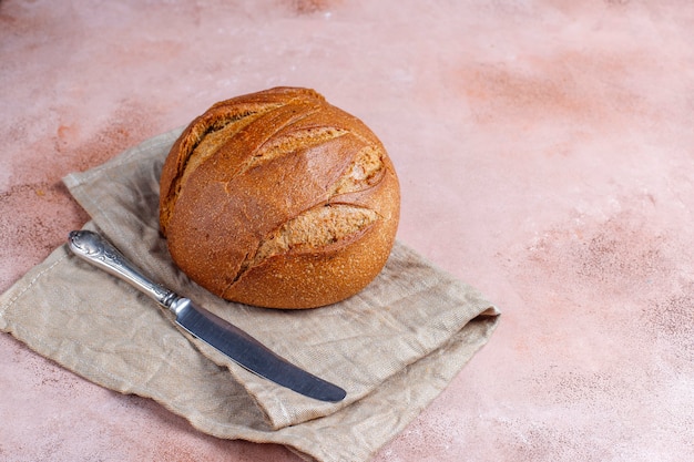 Freshly baked rye wheat bread sliced.