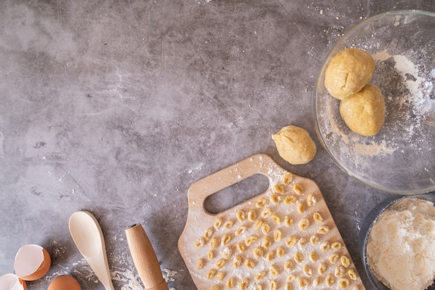 Free photo freshly made pasta with dough frame