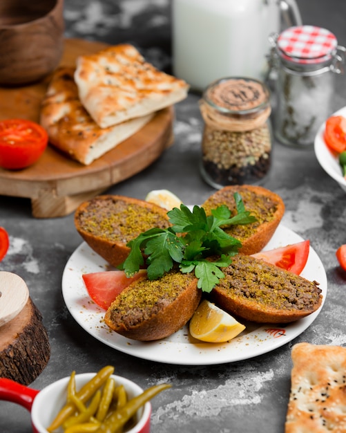 Fried bread filled with minced meat and tomato