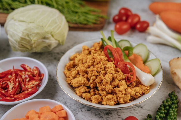 Fried Chicken Pop with Chili Scallions and tomatoes.