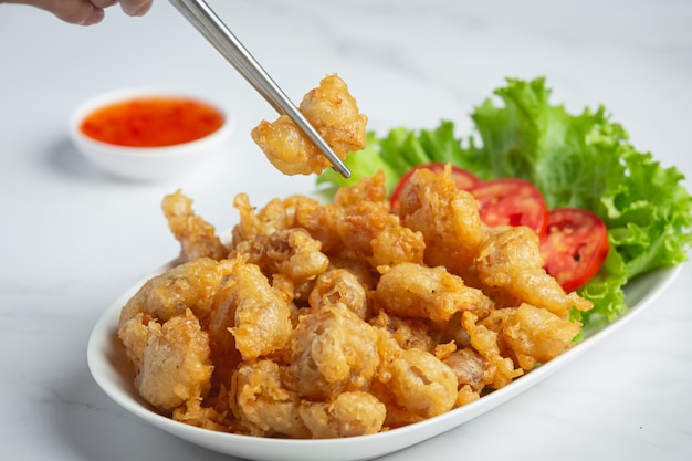 Fried Chicken Tendon serve with sauce