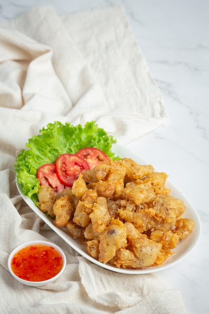 Fried Chicken Tendon serve with sauce