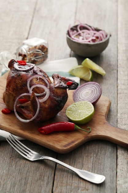 Free Photo fried chicken with onion and chili pepper