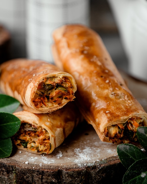 Fried crepe with vegetables on the table