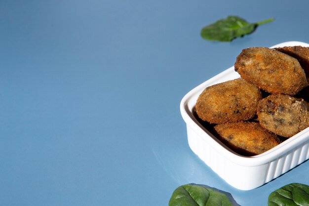 Fried croquette arrangement with copy space