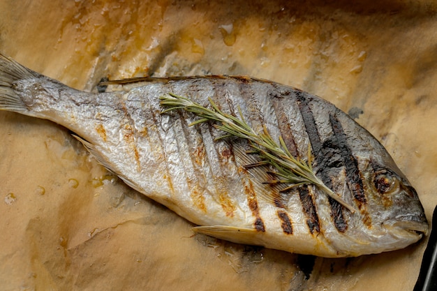 Free Photo fried fish with rosemary