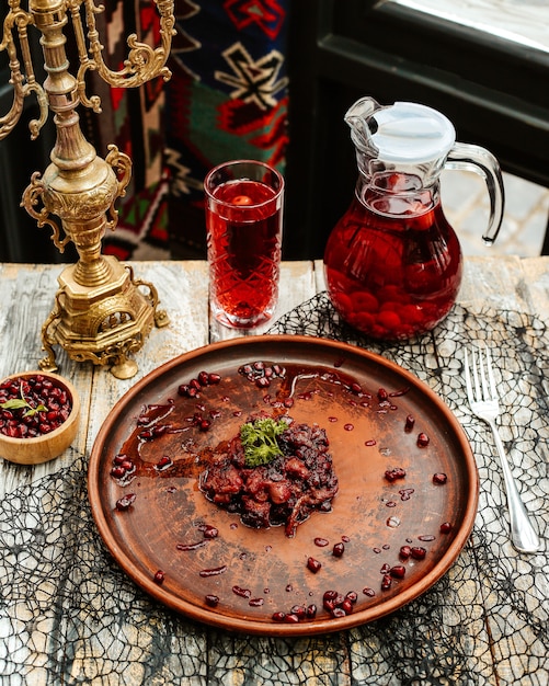 Free Photo fried meat prepared with onion and pomegranate sauce