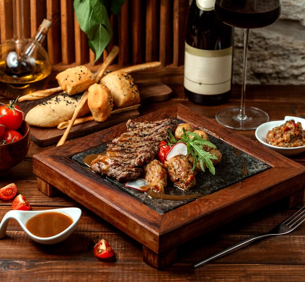 Fried meat with crisp and grill salad