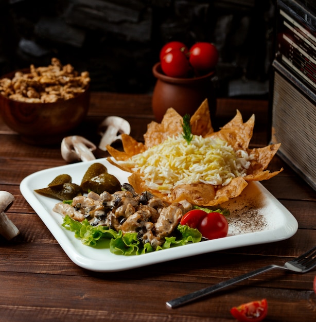 Fried meat with mushrooms and rice