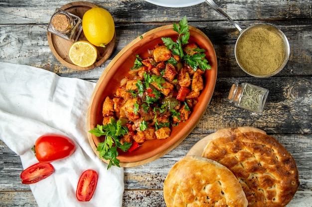 Free Photo fried meat with vegetables top view