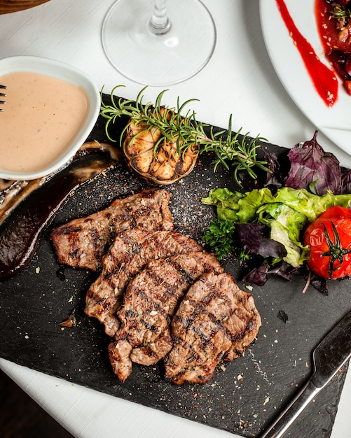 Fried piece of steak on the plate